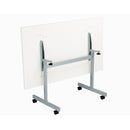White One Eighty rectangular tilting table by TC with a silver base, shown from the back view.
