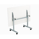 Back view of the TC One Eighty Rectangular Tilting Table in white with a sturdy metal frame and adjustable tilting mechanism.