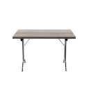 Gray oak folding rectangular table by TC, featuring sturdy legs and a smooth surface, ideal for versatile seating and workspace needs.