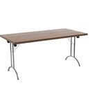 Rectangular walnut folding table by TC with sturdy metal legs, compact design, suitable for versatile indoor or outdoor use.
