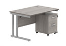 Core Twin upright rectangular desk bundle with two-drawer pedestal in Alaskan Grey Oak by TC, shown from the front.