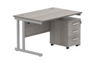 Core Twin upright rectangular desk bundle with 3-drawer pedestal in Alaskan Grey Oak finish, showcasing the modern workstation setup.