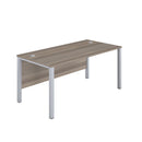 Front view of the TC Goal Post Rectangular Desk in Grey Oak finish, showcasing its modern design and clean lines.