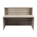Front view of the TC Reception Unit in Grey Oak finish, featuring sleek design and modern style for welcoming reception areas.