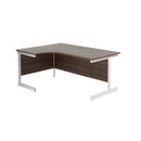 Front view of TC Office single upright radial desk in dark walnut finish with a spacious workspace and modern design.