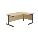 Front view of TC Office Single Upright Radial Desk in Maple, showcasing its sleek design and spacious workspace.