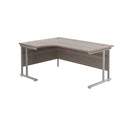 Front view of the TC Office Twin Upright Radial Desk in Grey Oak with a modern design and spacious work surface.