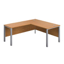 Front view of TC Goal Post Return Desk in Nova Oak finish, showcasing the modern office desk with clean lines and spacious workspace.