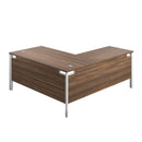 TC Goal Post Return Desk in walnut finish, showing the back view with sleek wood grain and modern office design.