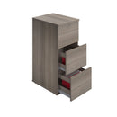 Essentials Wooden Filing Cabinet in grey oak by TC, front view with open drawers showing organized files and storage compartments.