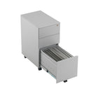 Front view of TC steel under desk pedestal with three drawers in silver, showing open top drawer and overall sleek design.