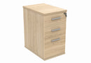 Front view of the TC Core Desk High Pedestal in Canadian Oak, showing sleek wooden finish and sturdy construction for office storage.
