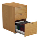 Front view of TC Essentials Desk High Pedestal in Nova Oak with open file drawers for organized office storage.