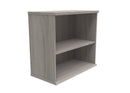 Core Wooden Bookcase in Alaskan Grey Oak finish by TC, showcasing its sleek design and multiple shelves for storage.