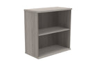 Front view of TC Core Wooden Bookcase in Alaskan Grey Oak with adjustable shelves and modern design.
