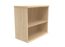 Front view of TC Core Wooden Bookcase in Canadian Oak, showcasing its sturdy wood construction and spacious shelves.