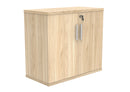Front view of the TC Core Wooden Cupboard in Canadian Oak, showcasing its natural wood finish and modern design.