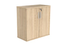 Front view of TC Core wooden cupboard in Canadian oak with sleek design and natural wood finish.