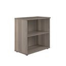 Front view of the TC Essentials Wooden Bookcase in grey oak finish, showcasing multiple shelves for storage and display.