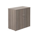 Front view of TC Essentials Wooden Cupboard in Grey Oak finish, showcasing its sleek design and storage compartments.