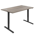 Economy single motor sit-stand desk in grey oak and black finish with 1200mm width, suitable for ergonomic workspace setup.
