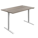 Economy single motor sit-stand desk by TC with 1200mm grey oak and white finish, adjustable height for ergonomic workspace.