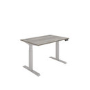 Front view of TC Core Dual Motor Sit-Stand Desk in Alaskan Grey Oak with adjustable height and sturdy metal frame.