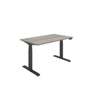 Front view of TC Core Dual Motor Sit Stand Desk in Alaskan Grey Oak finish with black frame, showcasing adjustable height and sleek design.