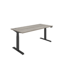 Front view of TC Core dual motor sit-stand desk in Alaskan Grey Oak finish, showing clean modern design and adjustable height features.