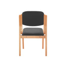 TC Renoir chair with wooden frame and upholstered seat, shown from the back with a sleek, modern design.