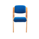 Front view of the TC Renoir Chair with a sleek, modern design featuring a plush upholstered seat and stylish wooden legs.