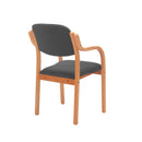 TC Renoir armchair featuring a plush upholstered seat and back, viewed from the rear showing stylish armrests and elegant design.