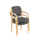 Stacked Renoir armchair by TC with wooden legs and fabric upholstery, showing a modern, comfortable design.