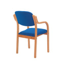 TC Renoir armchair with wooden legs, showcasing a plush fabric upholstery and a comfortable backrest from the rear view.
