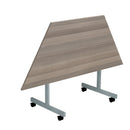 Grey oak One Eighty Trapezoidal Tilting Table by TC, showing its trapezoidal shape and tilting surface for versatile use.