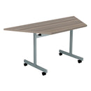 Grey oak One Eighty Trapezoidal Tilting Table by TC, showcasing its unique trapezoidal design and tilting feature.