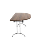 Walnut-colored One Union D-End folding table by TC, showing its sturdy wooden surface and foldable metal frame for easy storage.