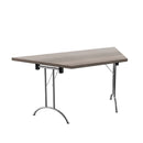 Gray oak folding trapezoidal table by TC, sturdy and portable for versatile use in home or office settings.