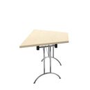 Maple-colored One Union trapezoidal folding table by TC, shown in a folded position with sturdy legs and smooth surface.