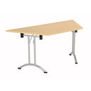 TC One Union trapezoidal folding table in Nova Oak finish, showing its sturdy frame and spacious tabletop design.