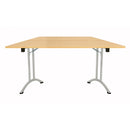 TC One Union trapezoidal folding table in Nova Oak finish, showing its sleek, lightweight design with foldable legs for easy transport.
