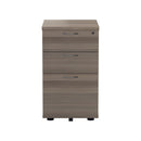 Front view of TC 3 Drawer Under Desk Pedestal in grey oak finish, designed for office storage beneath a desk.