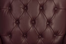 Teknik office guest chair in burgundy bonded leather with traditional button tufting and luxurious design.