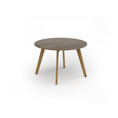 Unity circular dining table by Dams with Nebraska oak finish and solid oak legs, featuring a smooth round tabletop.
