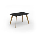 Black Unity dining table with solid oak legs by Dams, showcasing a sleek tabletop and sturdy wooden support.