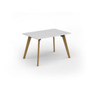 White Unity dining table with solid oak legs by Dams, showcasing a sleek tabletop and sturdy wooden support structure.