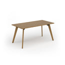 Dams Unity dining table with solid oak legs, featuring a smooth wooden surface and modern design for dining spaces.