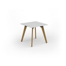 Dams Unity dining table with white surface and solid oak legs, showcasing a modern and sturdy design in a contemporary dining room