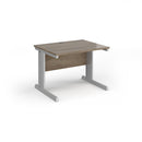 Dams Vivo 800mm deep straight desk in Nebraska Oak finish, showing the sleek wooden surface and modern design.