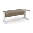 Dams Vivo 800mm deep straight desk in Nebraska Oak finish, showing a spacious office desk with clean lines and natural wood grain.